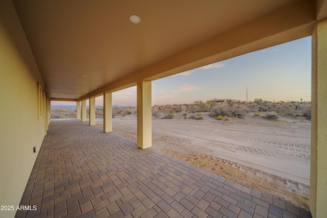 view of patio terrace at dusk