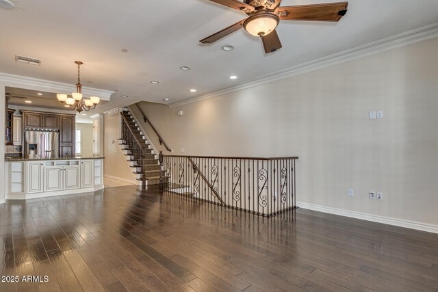 2470 E Roma Ave, Phoenix, AZ 85016 - unfurnished room featuring crown molding, a chandelier, a ceiling fan, dark wood-style floors, and recessed lighting