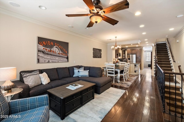2470 E Roma Ave, Phoenix, AZ 85016 - living room featuring a chandelier, ornamental molding, stairway, a ceiling fan, and dark wood finished floors