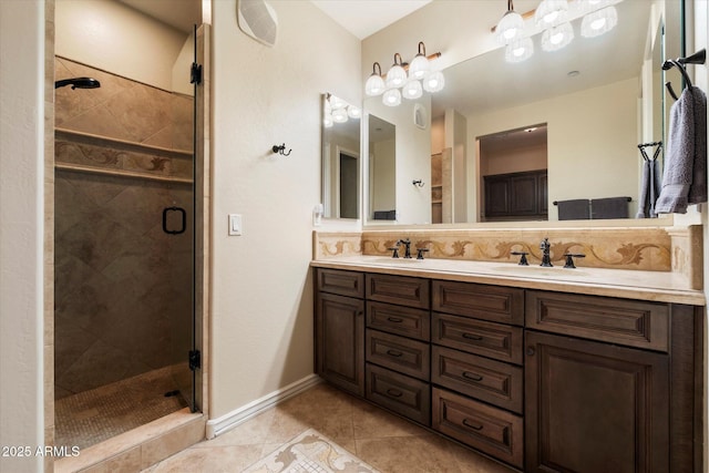2470 E Roma Ave, Phoenix, AZ 85016 - bathroom with double vanity, a stall shower, tile patterned flooring, and decorative backsplash