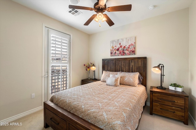 2470 E Roma Ave, Phoenix, AZ 85016 - bedroom with light carpet and a ceiling fan