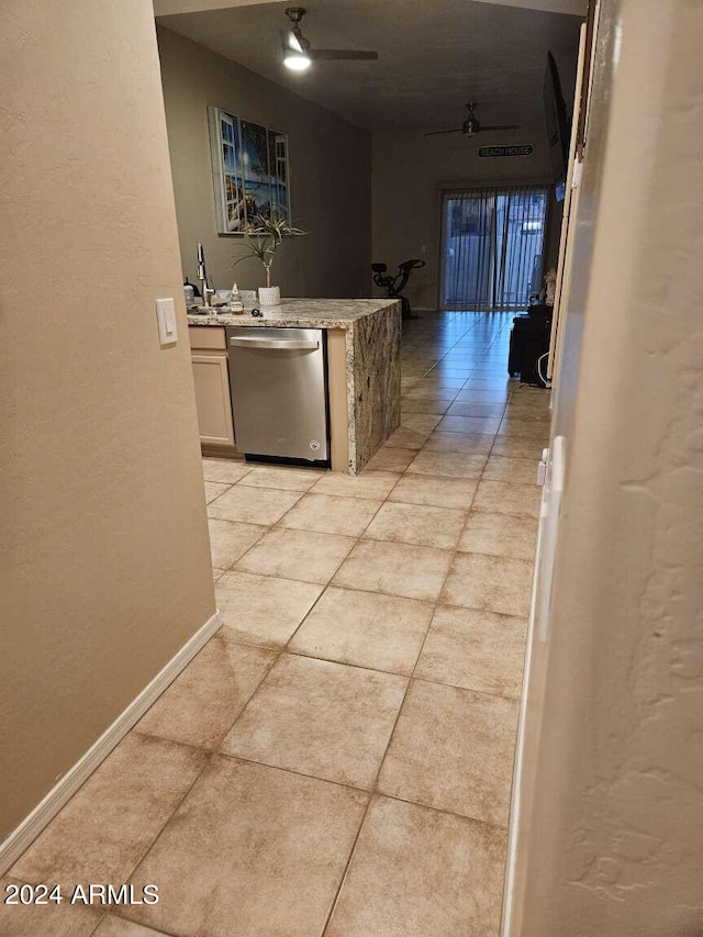 hall with light tile flooring