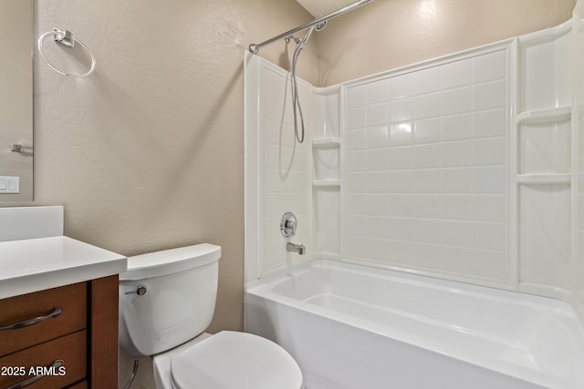 full bathroom featuring shower / bathtub combination, vanity, and toilet