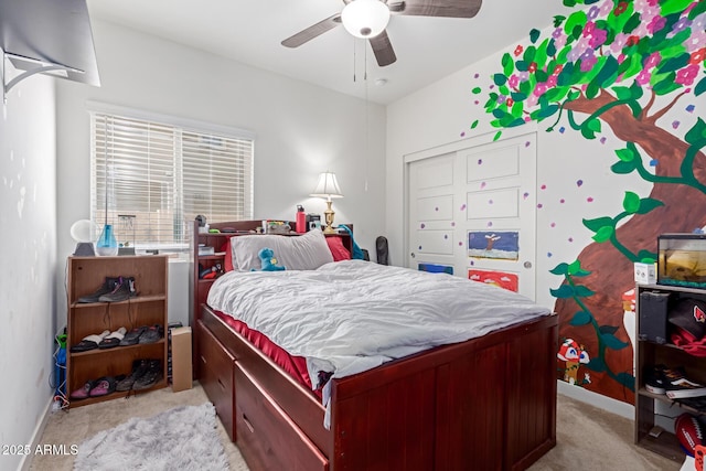 carpeted bedroom with ceiling fan