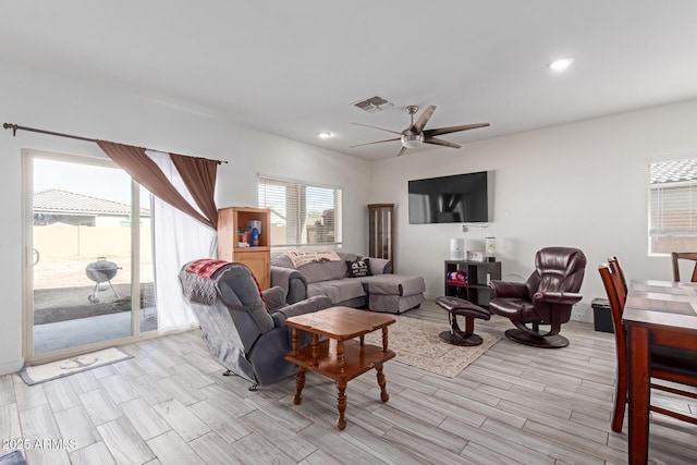 living room featuring ceiling fan