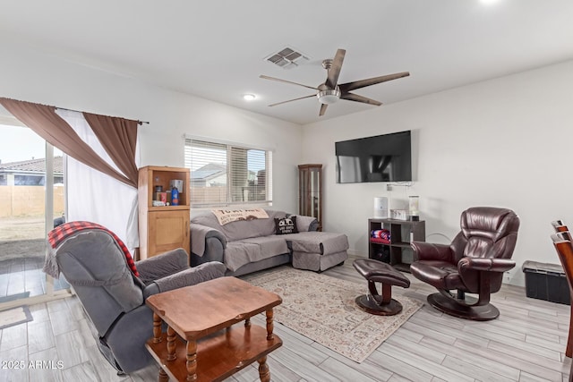 living room with ceiling fan