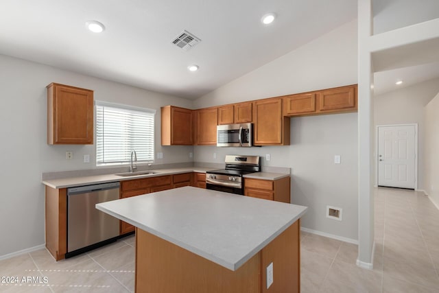 3847 W Yellow Peak Dr, San Tan Valley, AZ 85144 - kitchen with visible vents, a sink, stainless steel appliances, light countertops, and brown cabinets