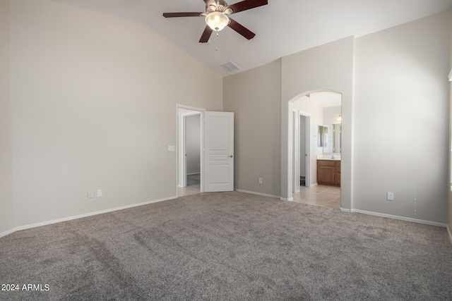 3847 W Yellow Peak Dr, San Tan Valley, AZ 85144 - unfurnished bedroom featuring visible vents, baseboards, light colored carpet, arched walkways, and high vaulted ceiling