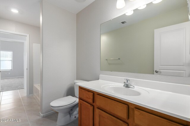 3847 W Yellow Peak Dr, San Tan Valley, AZ 85144 - full bathroom featuring tile patterned floors, visible vents, toilet, baseboards, and vanity