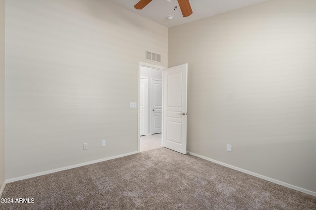 3847 W Yellow Peak Dr, San Tan Valley, AZ 85144 - empty room with visible vents, baseboards, light colored carpet, and ceiling fan