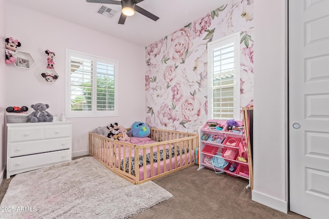 12083 W Peak View Rd, Peoria, AZ 85383 - bedroom with a crib, carpet floors, wallpapered walls, and a ceiling fan