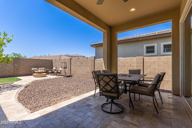 12083 W Peak View Rd, Peoria, AZ 85383 - view of patio featuring outdoor dining space, a fenced backyard, ceiling fan, and an outdoor living space
