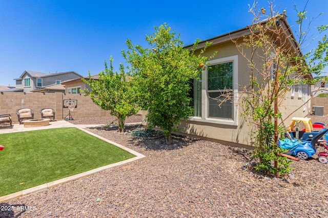 12083 W Peak View Rd, Peoria, AZ 85383 - view of yard featuring a fire pit and a patio area
