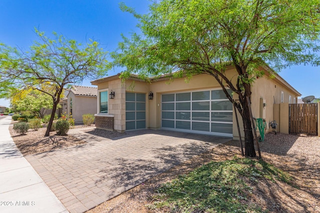 12083 W Peak View Rd, Peoria, AZ 85383 - view of front of house with driveway, stucco siding, fence, and a garage