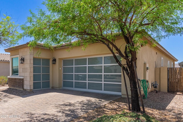 12083 W Peak View Rd, Peoria, AZ 85383 - view of front facade with decorative driveway and stucco siding