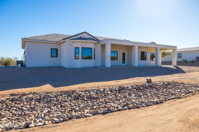 rear view of house with a patio area