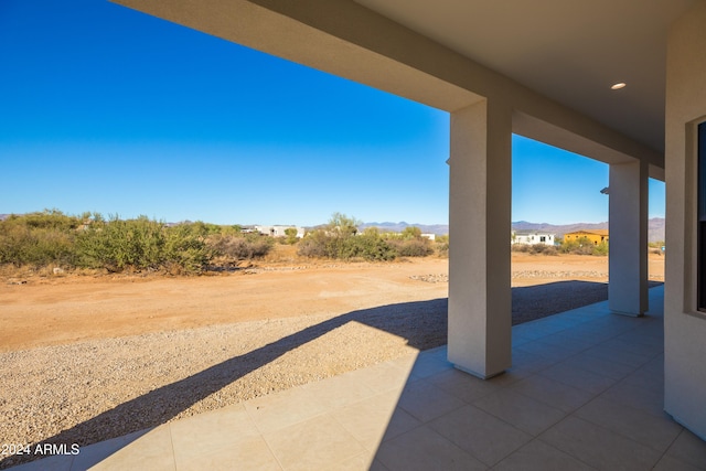 view of patio featuring a mountain view