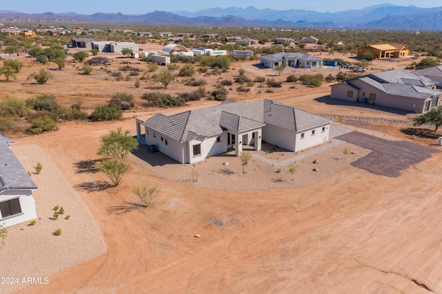 drone / aerial view featuring a mountain view