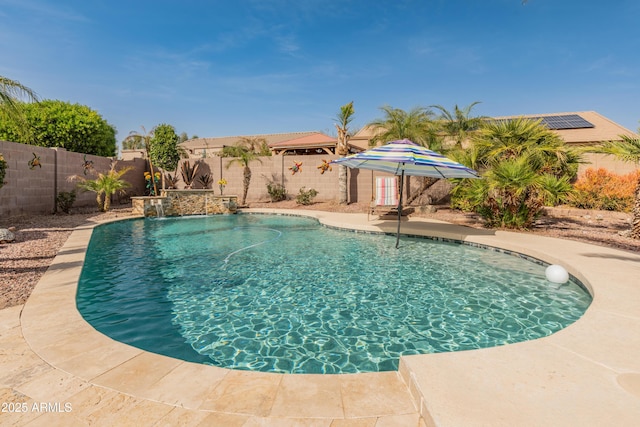 view of swimming pool with a patio area, a fenced backyard, and a fenced in pool