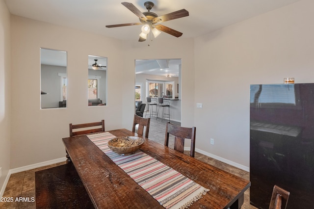 tiled dining space with baseboards