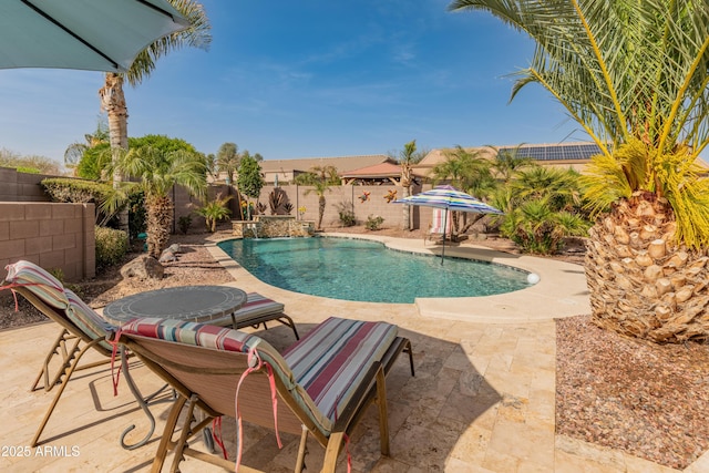 view of swimming pool featuring a fenced in pool, a patio area, and a fenced backyard