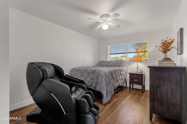 bedroom with wood-type flooring and ceiling fan