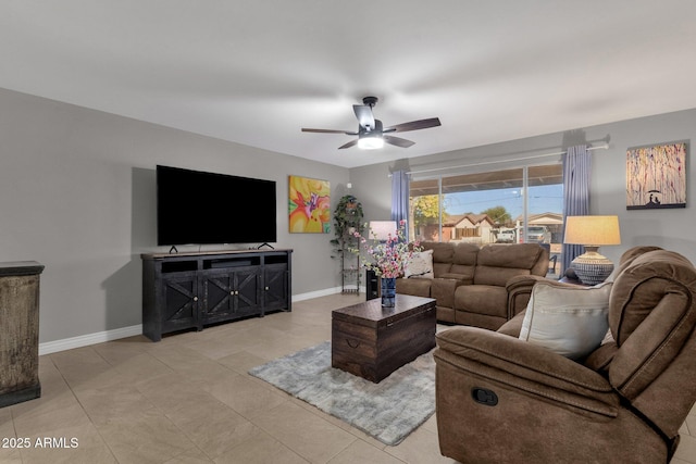 living room with ceiling fan and light tile patterned floors