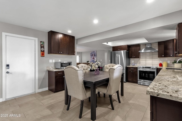 dining space with sink