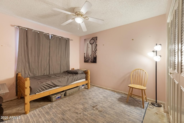 3410 W Pershing Ave, Phoenix, AZ 85029 - carpeted bedroom featuring a textured ceiling, a ceiling fan, and baseboards