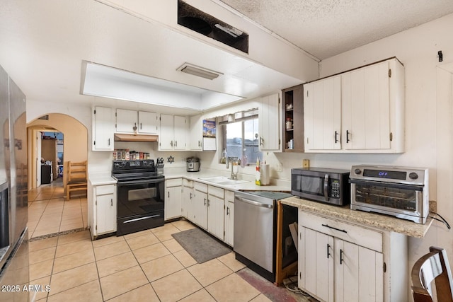 3410 W Pershing Ave, Phoenix, AZ 85029 - kitchen with appliances with stainless steel finishes, a sink, light countertops, under cabinet range hood, and a textured ceiling