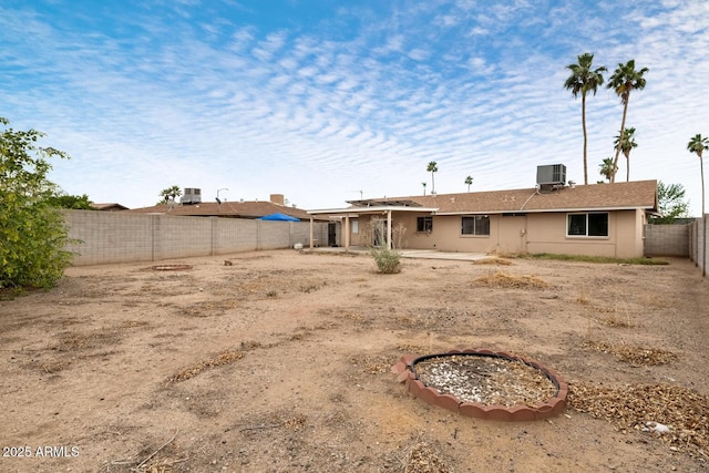 3410 W Pershing Ave, Phoenix, AZ 85029 - rear view of property featuring a patio, a fenced backyard, and central AC unit
