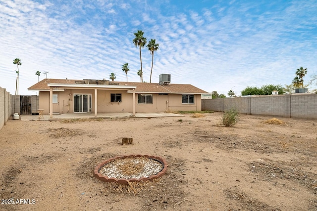 3410 W Pershing Ave, Phoenix, AZ 85029 - rear view of property featuring a patio, a fenced backyard, stucco siding, and cooling unit