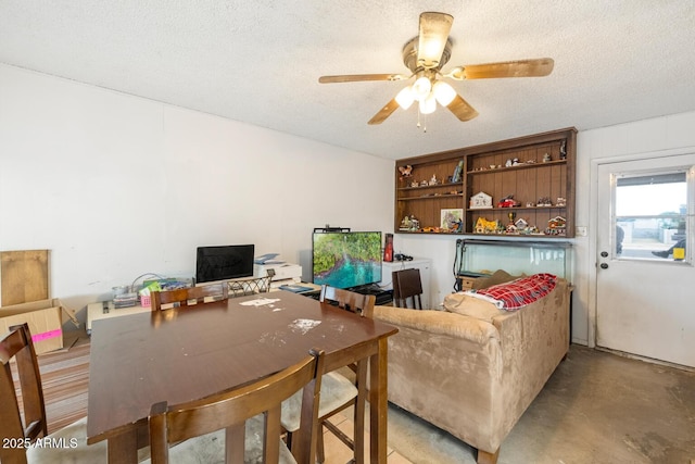 3410 W Pershing Ave, Phoenix, AZ 85029 - living area with ceiling fan, a textured ceiling, and concrete flooring