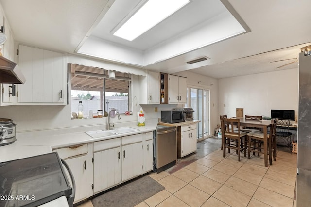 3410 W Pershing Ave, Phoenix, AZ 85029 - kitchen with stainless steel appliances, a sink, light countertops, and plenty of natural light