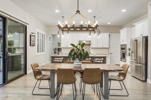 dining room with light hardwood / wood-style flooring