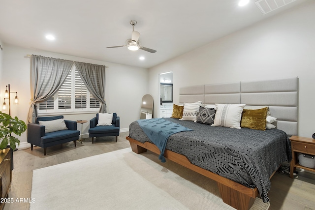 bedroom featuring light hardwood / wood-style flooring and ceiling fan