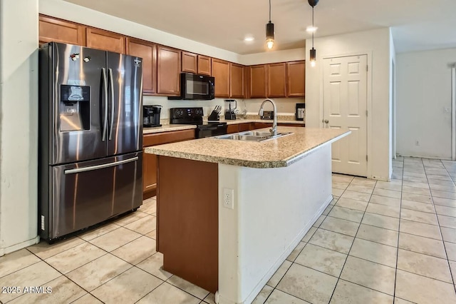 2955 E Flossmoor Ave, Mesa, AZ 85204 - kitchen with black appliances, light tile patterned floors, pendant lighting, and brown cabinets