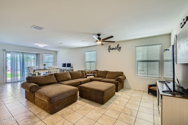 2955 E Flossmoor Ave, Mesa, AZ 85204 - living room featuring light tile patterned flooring and ceiling fan