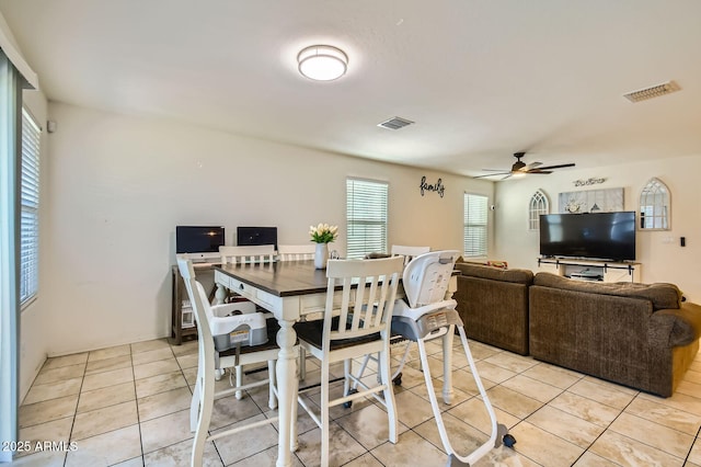 2955 E Flossmoor Ave, Mesa, AZ 85204 - dining room with light tile patterned flooring and ceiling fan