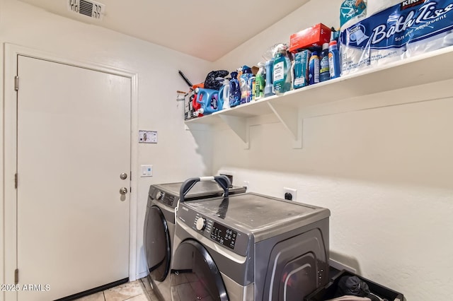 2955 E Flossmoor Ave, Mesa, AZ 85204 - washroom featuring washer and clothes dryer and light tile patterned floors