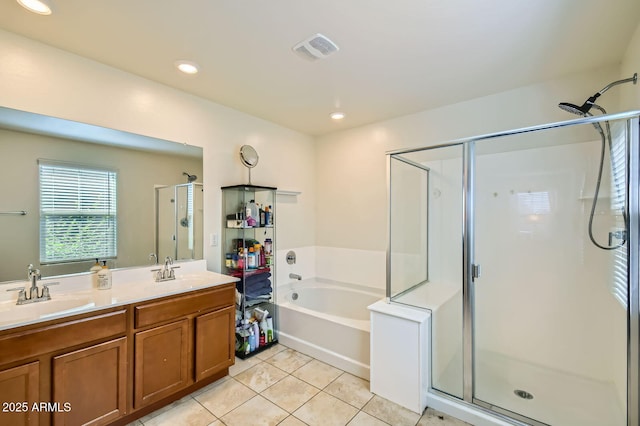 2955 E Flossmoor Ave, Mesa, AZ 85204 - full bath with tile patterned flooring, a shower stall, a garden tub, double vanity, and recessed lighting