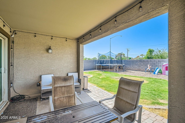 2955 E Flossmoor Ave, Mesa, AZ 85204 - fenced backyard with a trampoline and a patio