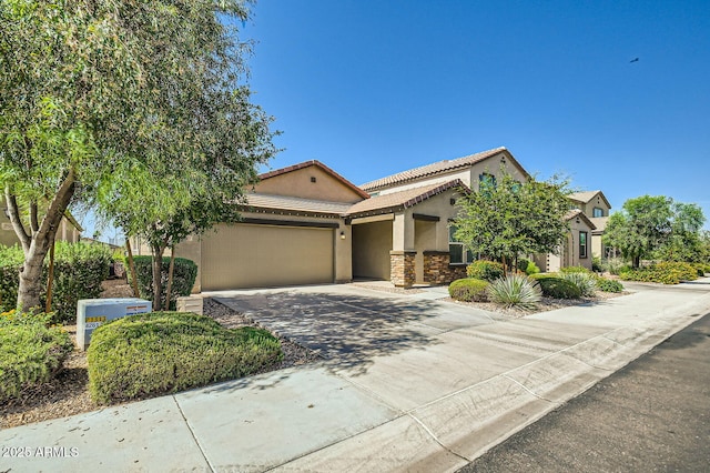 2955 E Flossmoor Ave, Mesa, AZ 85204 - view of front of home featuring stucco siding, a garage, driveway, and a tile roof
