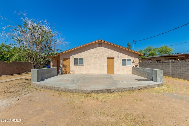 649 S Temple St, Mesa, AZ 85204 - rear view of property featuring a patio area and stucco siding