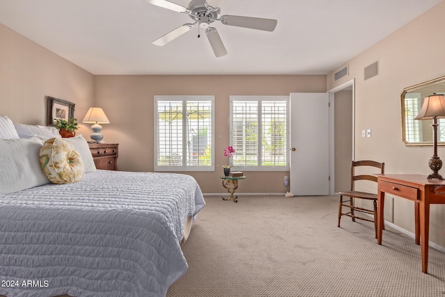 bedroom featuring ceiling fan and carpet floors