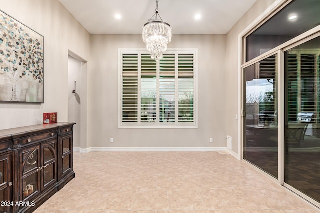 interior space with an inviting chandelier