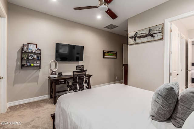 carpeted bedroom featuring ceiling fan