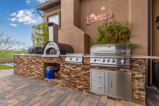 view of patio / terrace featuring a grill and area for grilling