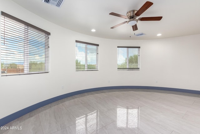 spare room featuring ceiling fan