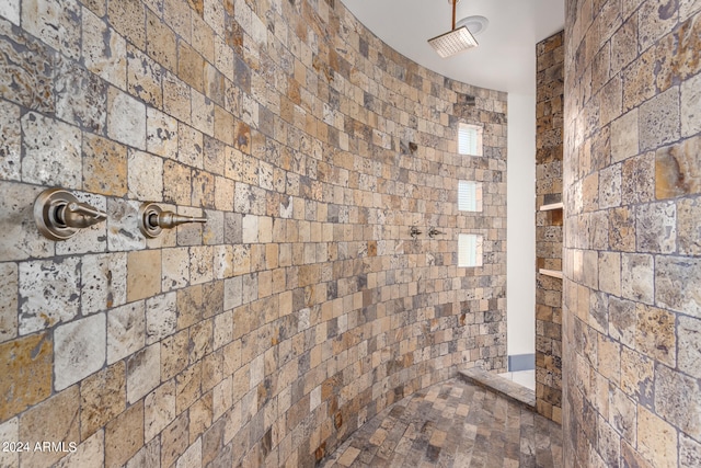 bathroom featuring a shower